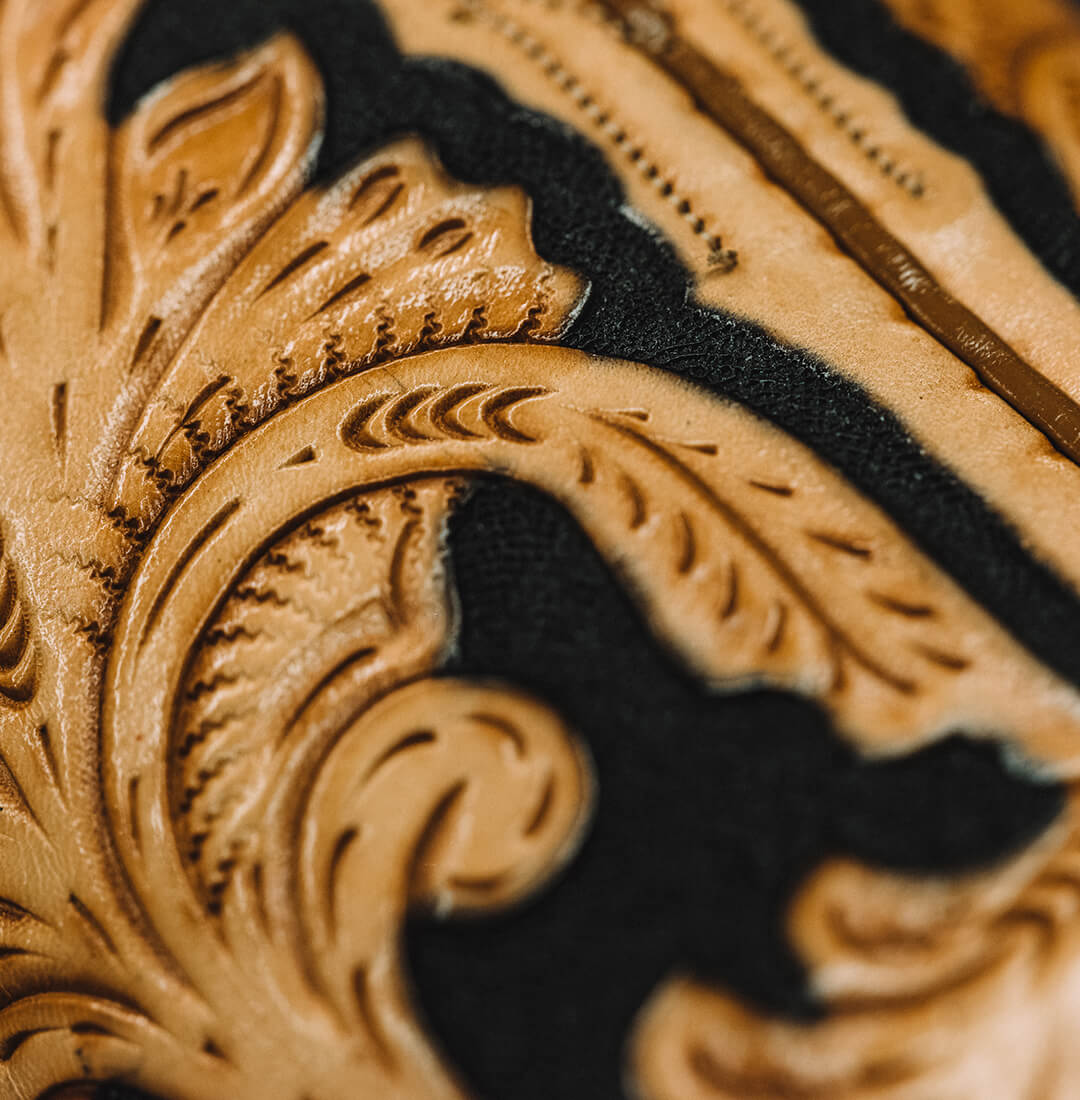 HAND-TOOLED LEATHER