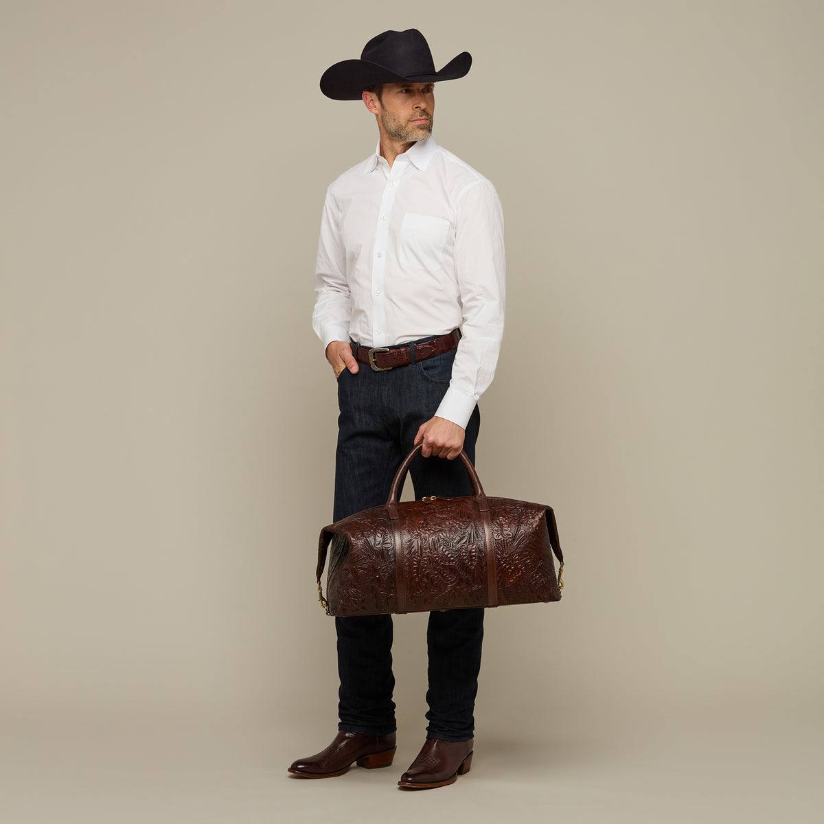 
    Hand-Tooled Duffle :: Brown